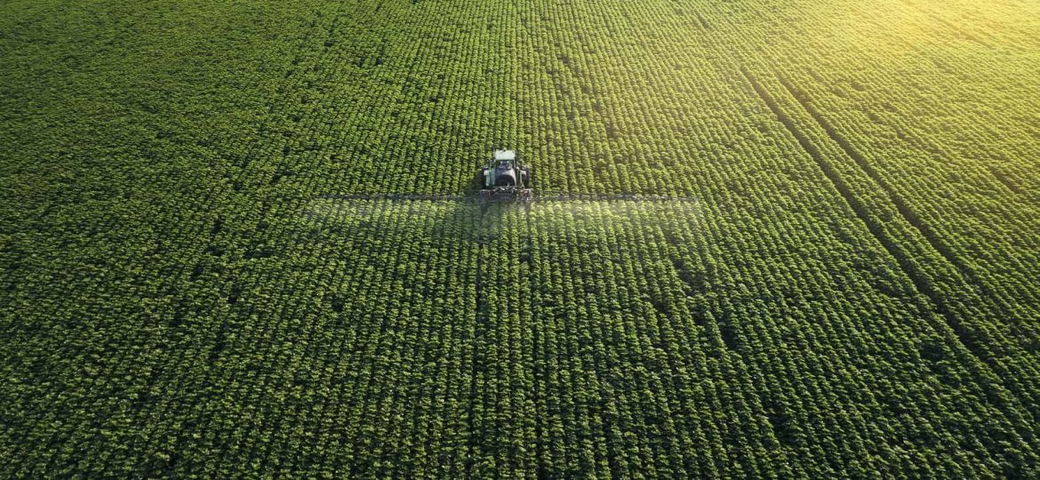 aerial-tractor-in-field-iStock-1154958041